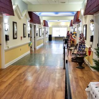 A brightly decorated hallway with various adornments on the walls.