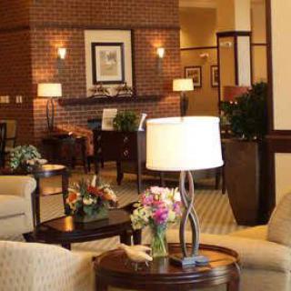 A cozy hotel lobby with comfortable seating and elegant decor.