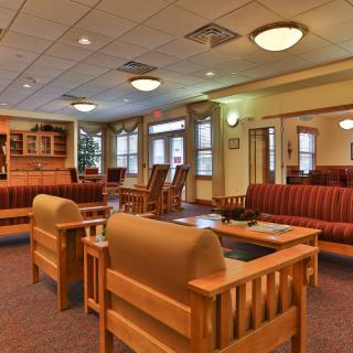 A cozy lobby area with comfortable seating and warm lighting.