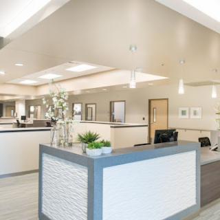 A modern and welcoming reception area in a medical office, designed to provide a comfortable environment for patients.