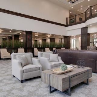A modern lobby with comfortable seating and elegant decor.