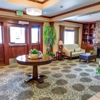 A cozy hotel lobby with comfortable seating and elegant decor.