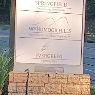 Sign for Springfield community, featuring Wyndmoor Hills and Evergreen.