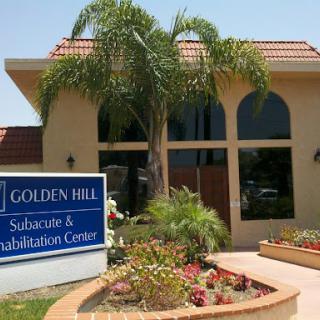Golden Hill Subacute & Rehabilitation Center, showcasing a welcoming environment with palm trees and vibrant landscaping.