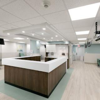A contemporary reception area in a medical office, featuring clean lines and a welcoming atmosphere.