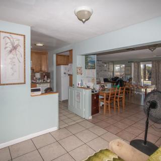 Open concept kitchen and living area with dining space.