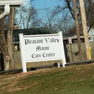 Sign for Pleasant Valley Manor Care Center.