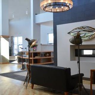 A modern living room with contemporary decor and open space.