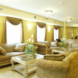 A well-decorated living room featuring elegant furniture and tasteful decor.
