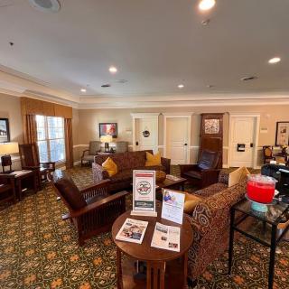 A cozy living room with comfortable seating and warm decor.