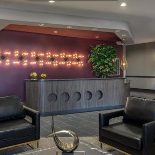 A modern lobby with stylish seating and contemporary lighting.