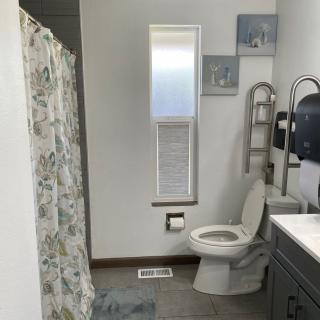 A clean and modern bathroom with essential fixtures.