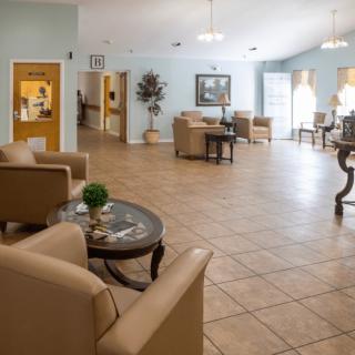 A spacious and well-lit lobby area with comfortable seating and tasteful decor.