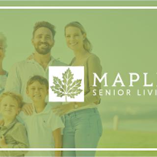 A joyful family portrait representing the warmth of senior living at Maple.