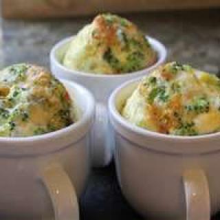 Baked egg mugs with herbs and vegetables.