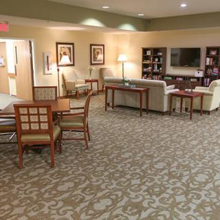 A cozy living room area with comfortable seating and stylish decor.
