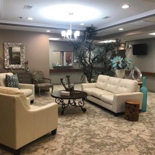 A cozy living room area with comfortable sofas and elegant decor.
