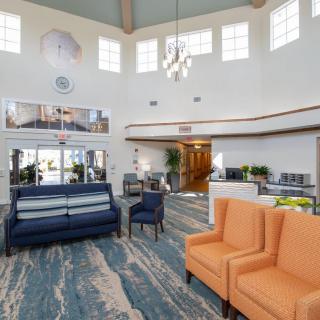 A modern lobby featuring stylish furniture and a welcoming atmosphere.