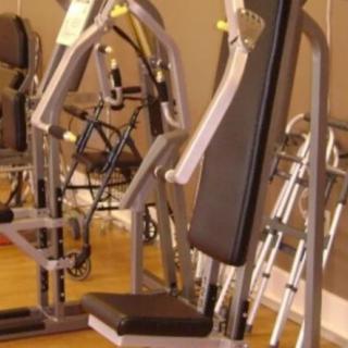 A variety of gym equipment for fitness and exercise.
