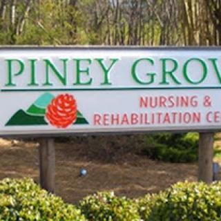 Entrance sign for Piney Grove Nursing & Rehabilitation Center.