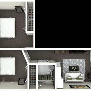 A top-down view of a floor plan featuring a bedroom and living room layout.