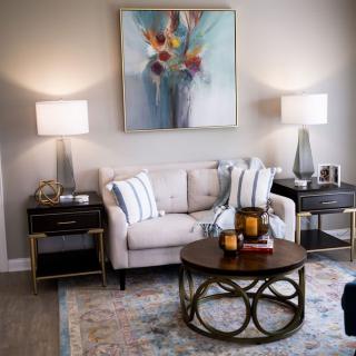 A modern living room with elegant furniture and stylish decor.