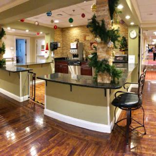 A cozy kitchen and dining area beautifully decorated for the holiday season.