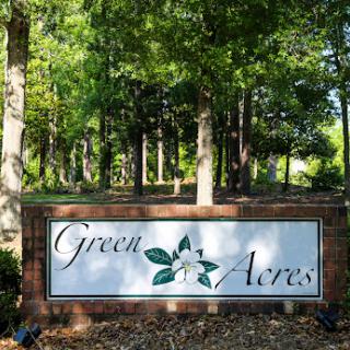 Welcome to Green Acres, a serene and nature-filled community.