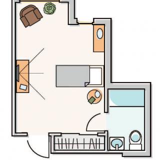 Studio apartment floor plan with furniture arrangement.