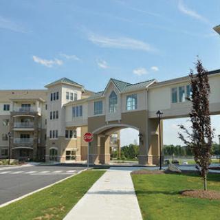 A modern residential apartment complex with a distinctive architectural design.