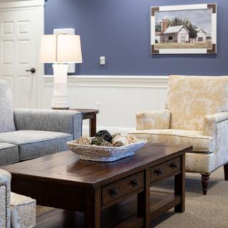 A cozy living room setup featuring stylish furniture and modern decor.