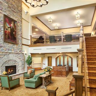 A spacious and inviting lobby with comfortable seating and elegant decor.