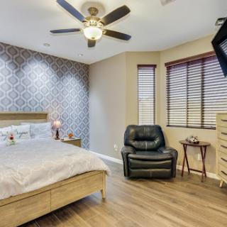 A beautifully designed modern bedroom featuring elegant decor and comfortable furniture.