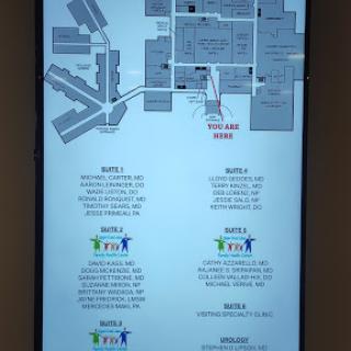 Directional map showcasing the layout of a building along with key information points.