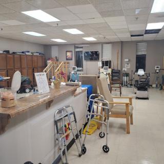 A view of a rehabilitation clinic showcasing various medical equipment and assistive devices.