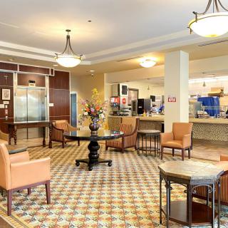 A welcoming hotel lobby with comfortable seating and elegant decor.