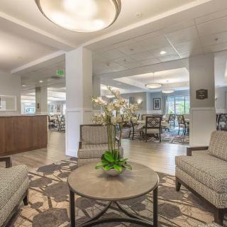 A modern lobby with comfortable seating and elegant decor.