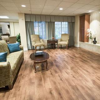 A cozy living room with comfortable seating and elegant decor.