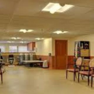 A calm waiting area featuring chairs and a well-lit environment.