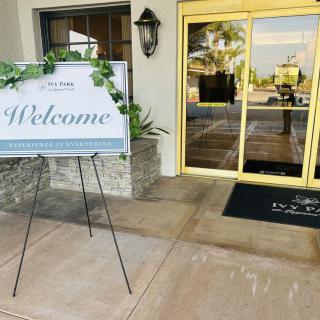 An inviting welcome sign at the entrance of a venue.
