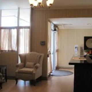 A cozy lobby area with comfortable seating and warm lighting.