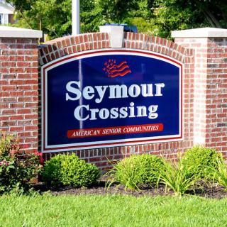 Entrance sign for Seymour Crossing, an American Senior Community.