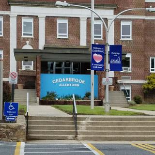 Entrance to a medical facility with clear signage.