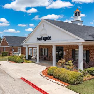 A well-maintained residential building named Northgate, featuring a welcoming entrance and landscaped surroundings.
