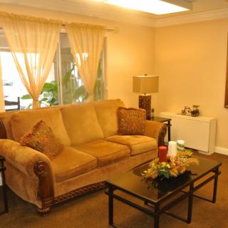A cozy living room with a comfortable sofa and stylish decor.