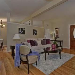A cozy living room with stylish furniture and elegant decor.