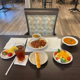 A delightful dining experience featuring a variety of dishes and drinks.