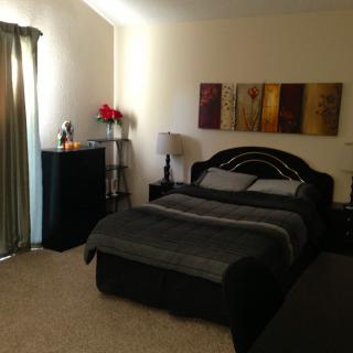 A modern and cozy bedroom with a comfortable bed and stylish decor.