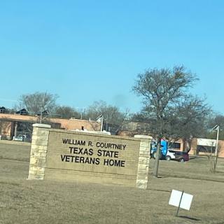 Sign for the William R. Courtney Texas State Veterans Home.