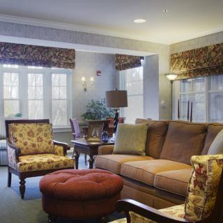 A cozy living room with comfortable seating and warm decor.